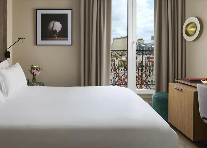Otel Nh Opera Faubourg 4*