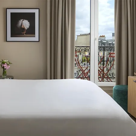 Отель Nh Opera Faubourg 4*